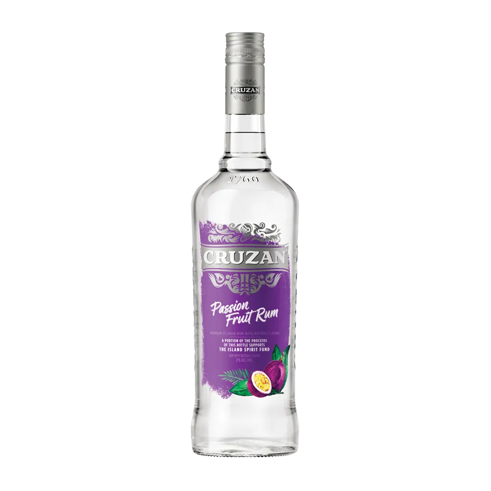 Clear glass bottle of Cruzan Passion Fruit Rum with a royal purple label and decorated with passion fruit.