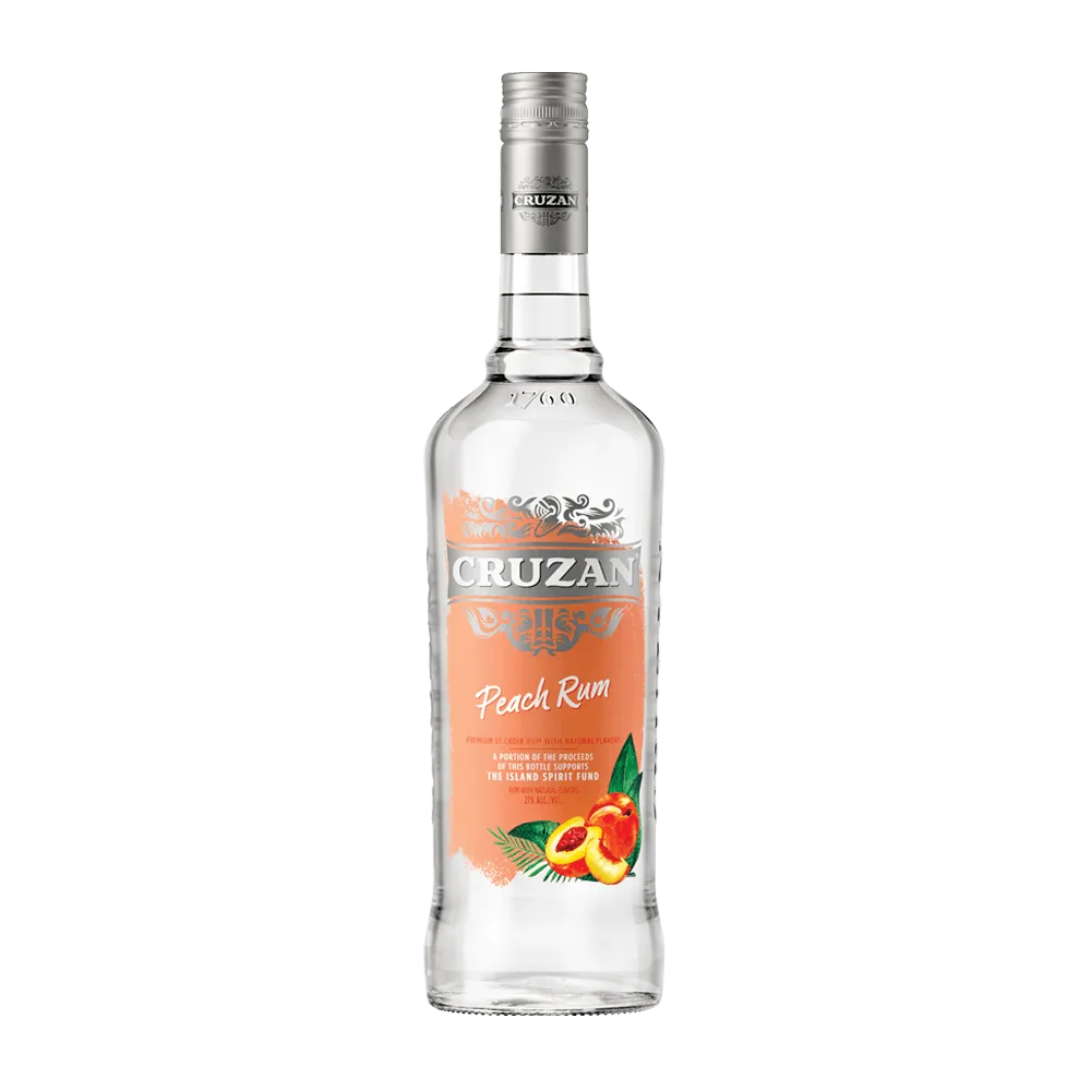 Cruzan Peach Rum glass bottle with a peach colored label adorned with sliced peaches.