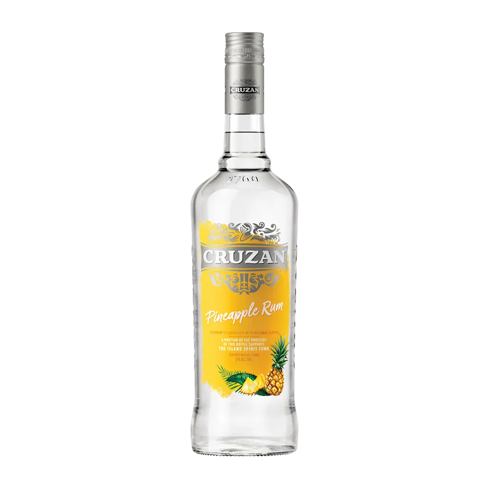 Clear bottle of Cruzan Pineapple Rum with a yellow label decorated with pineapples.