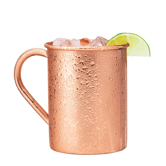Undertow cocktail in a copper mule mug, garnished with a slice of lime.