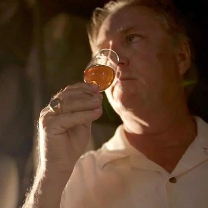 Gary Nelthropp takes a moment to examine a glass of Cruzan for clarity and perfection.