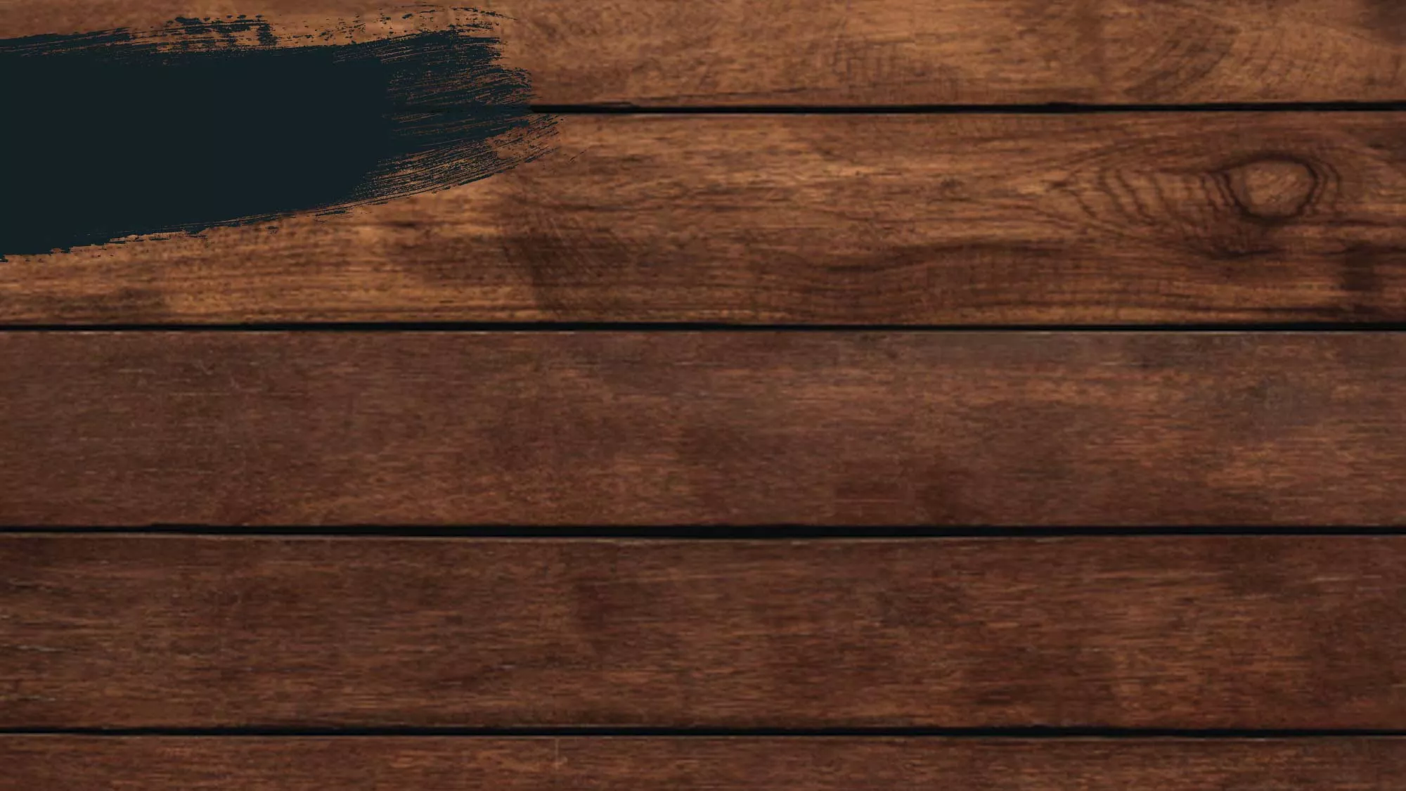 Background image of oak barrels used to age Cruzan Black Strap Rum.