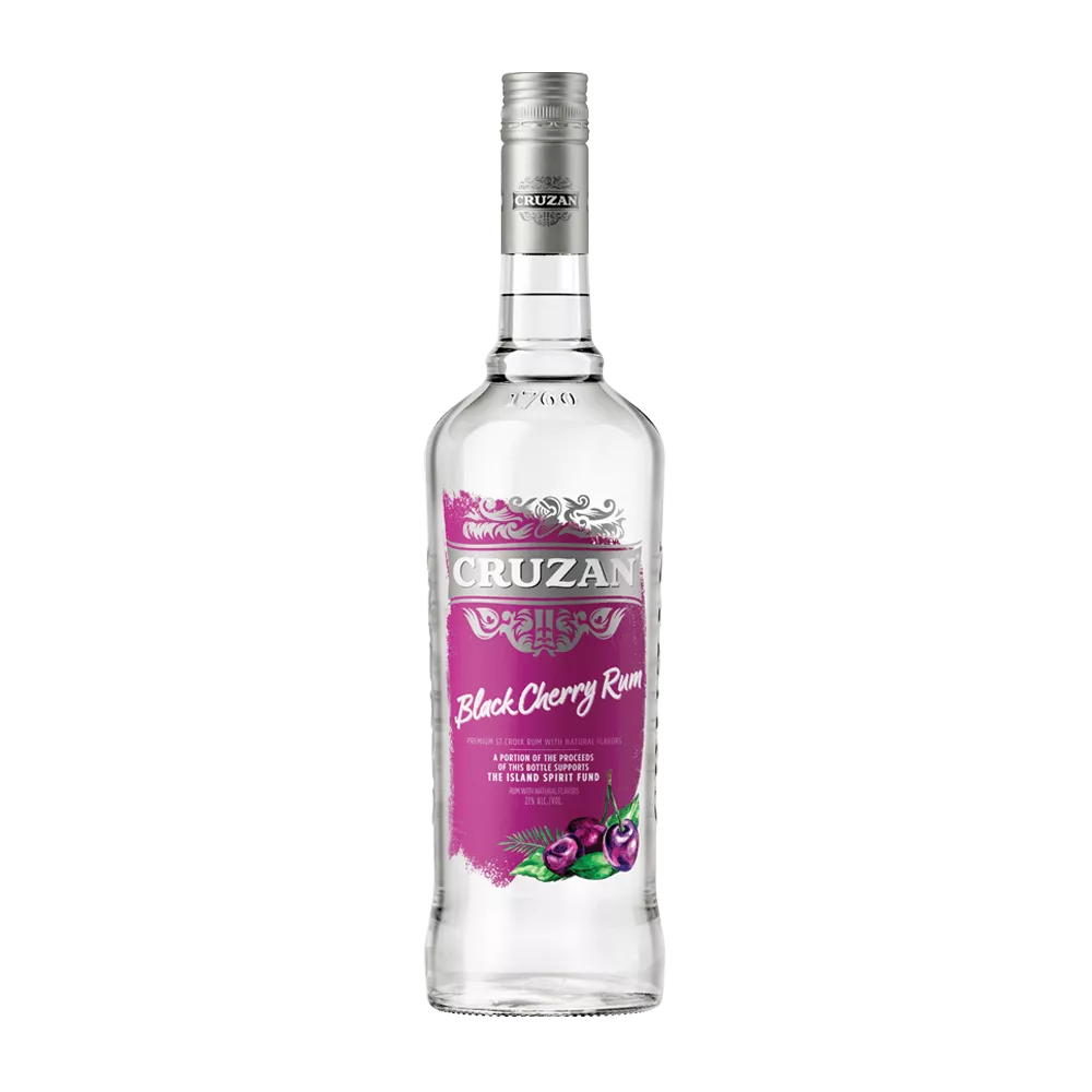 Clear glass bottle of Cruzan Black Cherry Rum with a magenta label and decorated with black cherries.