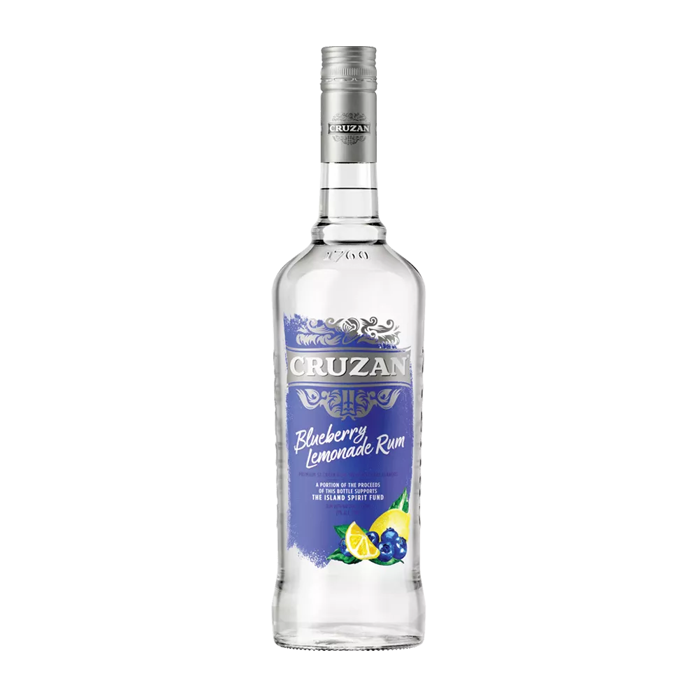Clear glass bottle of Cruzan Blueberry Lemonade Rum with a blue label and decorated with blueberries and lemon wedges.