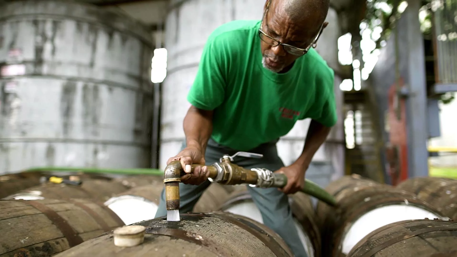Cruzan® employee preparing oak barrels and casks to make Cruzan® Rum.