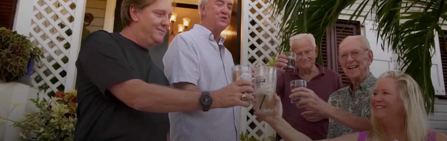 Nelthropp family toasting with Cruzan Rum drinks.